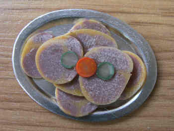 Cooked Beef Slices on Platter