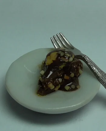 Slice of Chocolate Cake on Plate with Fork