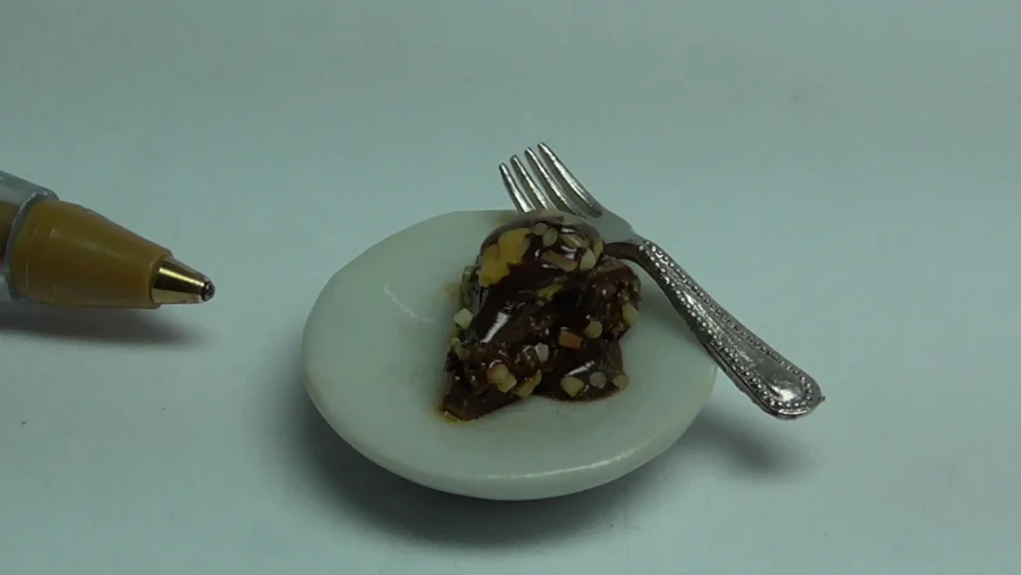 Slice of Chocolate Cake on Plate with Fork