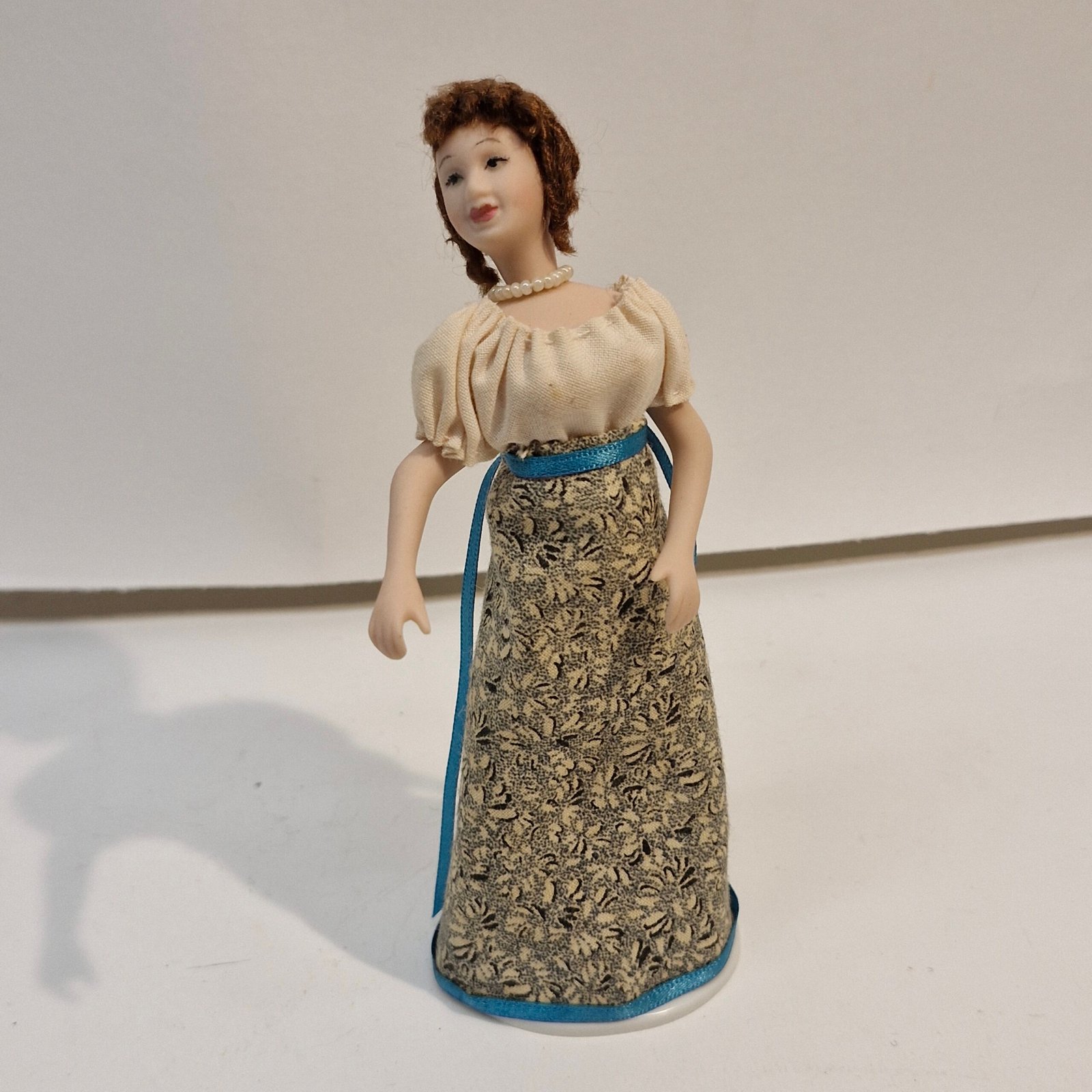 1:12th Scale Dolls House Miniatures, Quality Porcelain Doll. Woman KM05
