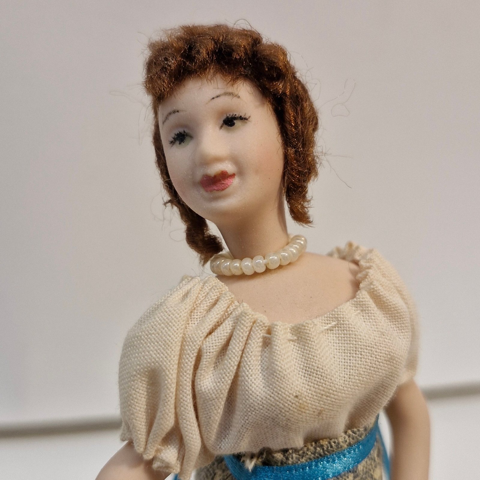 1:12th Scale Dolls House Miniatures, Quality Porcelain Doll. Woman KM05